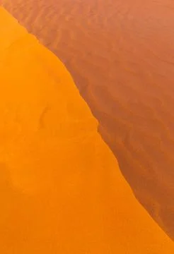 Close up orange sand texture in Empty Quarter Desert in United Arab Emirates. Stock Photos
