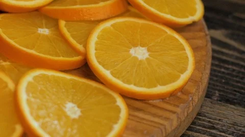 Close up  of oranges on a wooden table Stock Footage 103681259