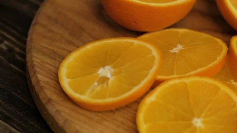 Close up  of oranges on a wooden table Stock Footage 103681284