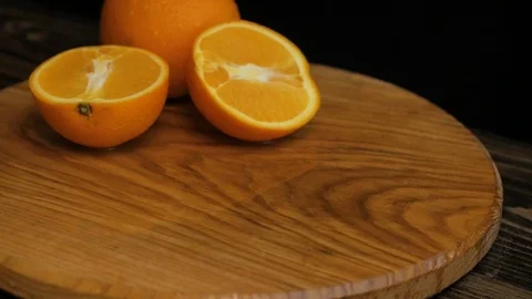 Close up  of oranges on a wooden table Stock Footage 103681339