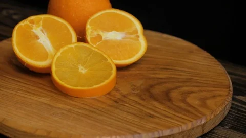 Close up  of oranges on a wooden table Stock Footage 103681858