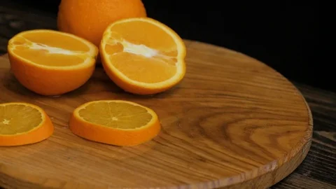 Close up  of oranges on a wooden table Stock Footage 103681861