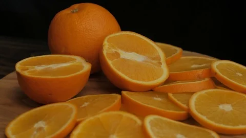 Close up  of oranges on a wooden table Stock Footage 103682793