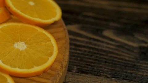 Close up  of oranges on a wooden table Stock Footage 103682810