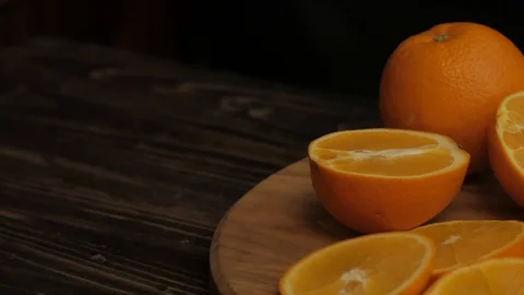 Close up  of oranges on a wooden table Stock Footage 103683108