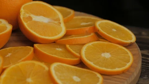 Close up  of oranges on a wooden table Stock Footage 103683163