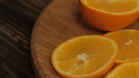 Close up  of oranges on a wooden table Stock Footage 103683169
