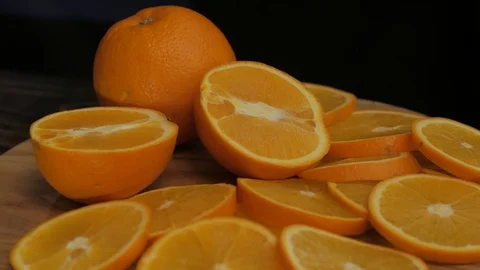 Close up  of oranges on a wooden table Stock Footage 103683295