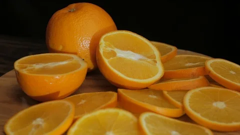 Close up  of oranges on a wooden table Stock Footage 103683377