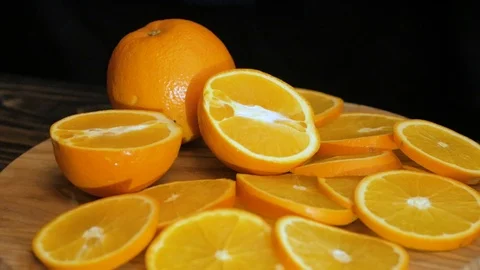 Close up  of oranges on a wooden table Stock Footage 103683459