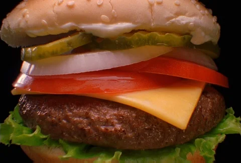 Close orbit of a cheeseburger Stock Footage 86882465