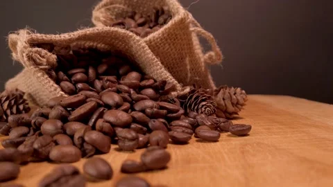 Close up orbiting shot of a bag of roasted coffee beans tabletop Stock-Footage 132147052