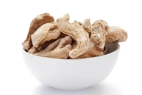 Close-up of Organic dry Ginger root (Zingiber officinale) or sonth on a ceram Фото