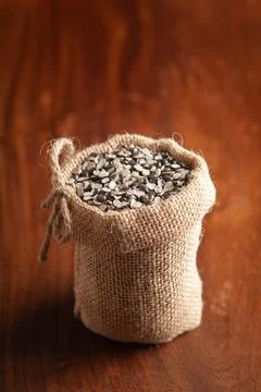 Close-up of Organic split black urad dal (Vigna mungo) with shell in a standi Stock Photos