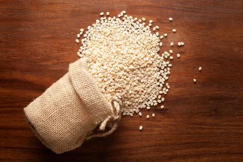 Close-up of Organic split polished white urad dal (Vigna mungo)   spilled out Stock Photos