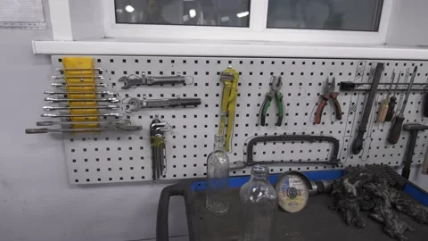 Close up at the organized workbench with different tools at the factory Stock Footage 149980715