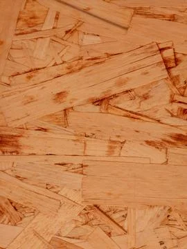 Close up of oriented strand board texture with natural wooden pattern Stock Photos