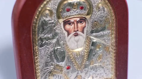 Close-up of the Orthodox icon of St. Nicholas on a rotating table. Stock Footage 141498341