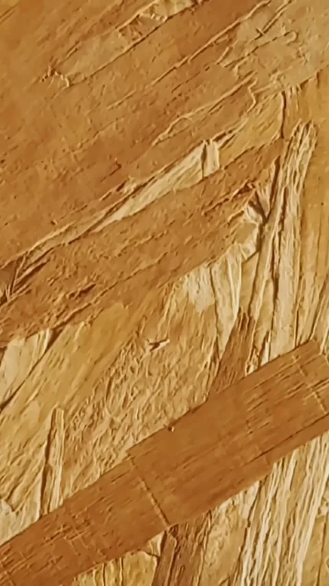 Close-up of OSB construction panel with pressed wood strands and rough flake Stock Footage 336839956