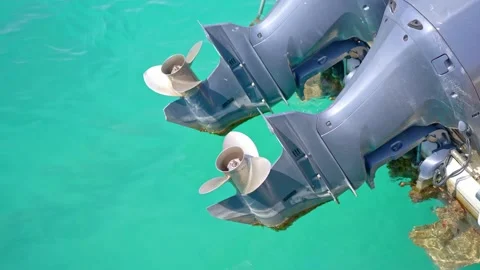 Close up of an outboard motor partial raised from the water. Stock Footage 177028196