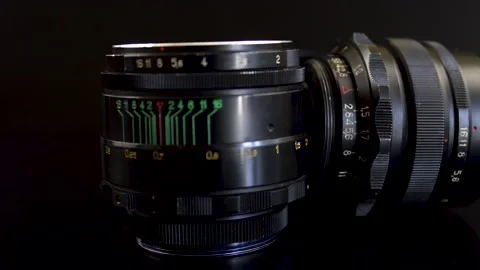 Close-up. Outdated lens for old cameras. Vintage Technology Stockbeeldmateriaal 187085237