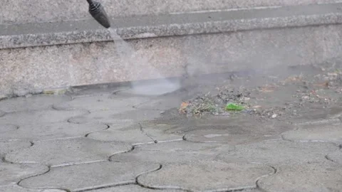 Close up Outdoor floor cleaning with high pressure water jet Stock Footage 196925914
