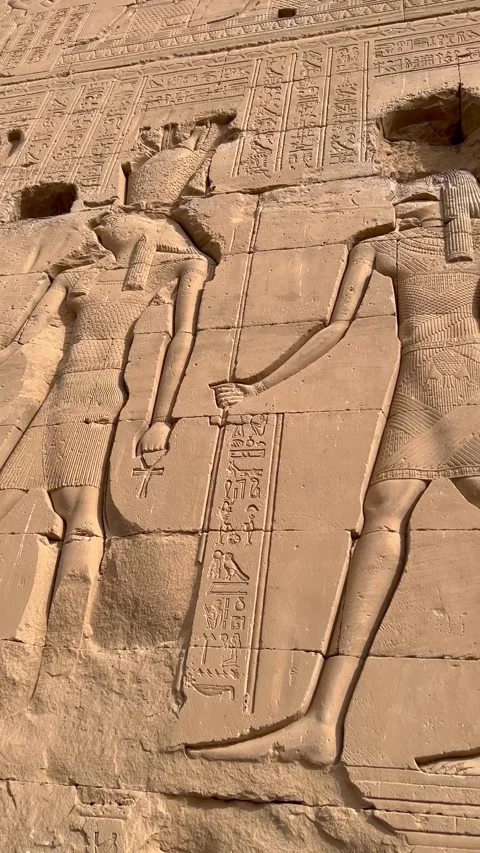 Close-up of the outer wall facade of the Temple of Hathor at Dendera, Egypt Video stock 330180498