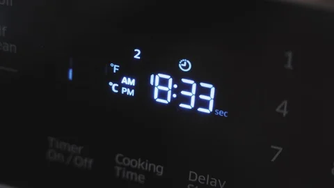 Close up of oven display flickering control panel blinking Electricity problem Stock Footage 129136304