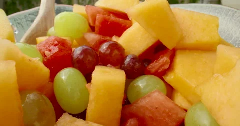 Close up over a delicious, fresh fruit salad Stock Footage 138136986