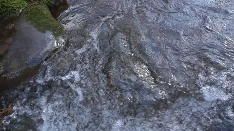 Close up overhead shot in slow motion on slider of bubbly waterfall Stock Footage 85102290
