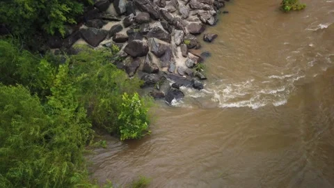 Close Up Overhead view looking down at river rocks in a swift fast moving, churn Stock Footage 286868165