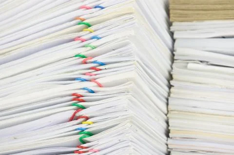 Close up overload paperwork have blur brown envelope on document Stock Photos