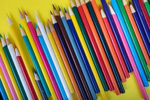 Close up overview flat lay background of colored pencils Stock Photos