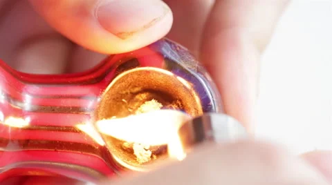 Close Up Overview of Lighting Medical Marijuana in a Pipe Stock Footage 48475505