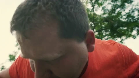 Close-up of overweight man sweating and doing push-ups to lose weight, workout Stock Footage 138821404