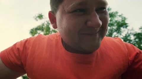 Close-up of overweight man sweating and doing push-ups to lose weight, workout Stock Footage 138821768