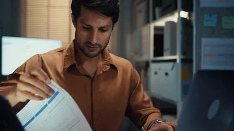Close up overworked businessman working late at office night. Stock Footage 340971248