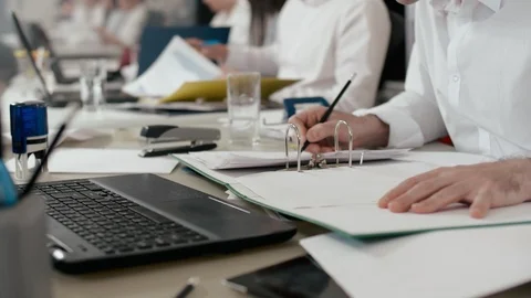 Close-up on overworked employee working in office with documents. Stock Footage 91459423