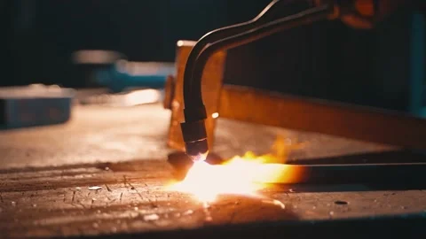 Close-up oxygen heating of metal in a workshop by a production worker Stock Footage 225462173