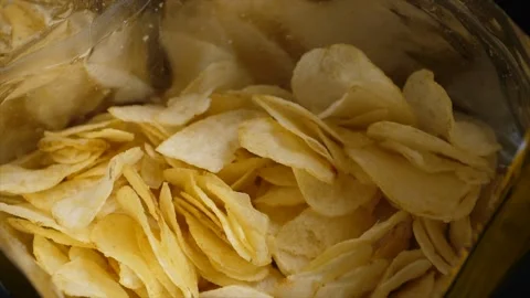 A close up of a pack of potato chips rotating Stock Footage 160563275