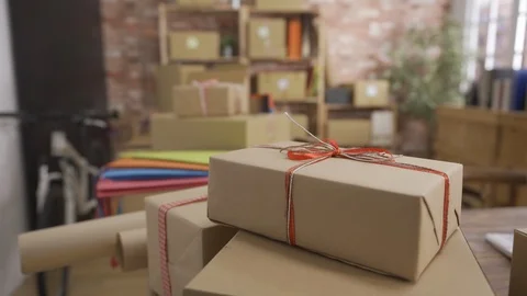 Close up of packages parcel on wooden table Stock Footage 109488217