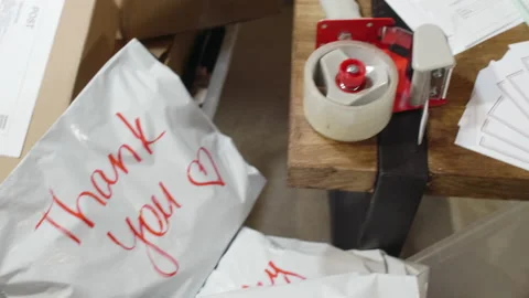 Close Up of Packed Orders Ready for Shipping to Customers Stock Footage 141765861