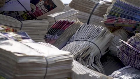 A Close-Up on Packed Papers-folded and packaged newspapers find Stock Footage 287625413