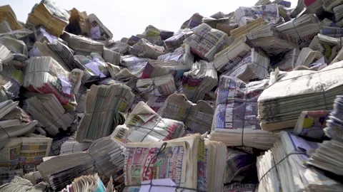 A Close-Up on Packed Papers-folded and packaged newspapers find Video stock 287625533