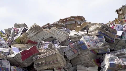 A Close-Up on Packed Papers-folded and packaged newspapers find Video stock 287625605