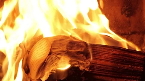 Close up of pages burning in a fire (1) Video stock 71390571