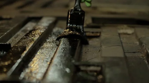 Close up of paint being brushed on a surface - Slow Motion Stock Footage 41669563