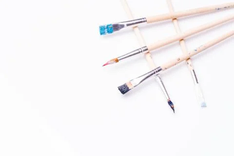 Close up of paint brushes on white background Stock Photos