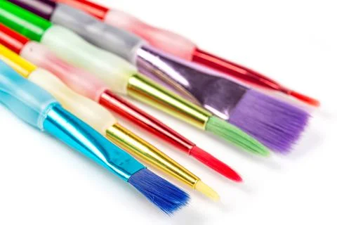 Close up of paint brushes on white background Stock Photos