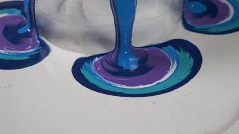 Close up. paint flowing on a canvas with a cut bottle. diy art and creation.. Stock Footage 238937007